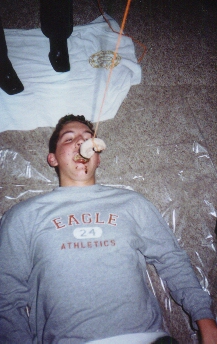 Andy attempts to chow down on a powdered donut to no avail